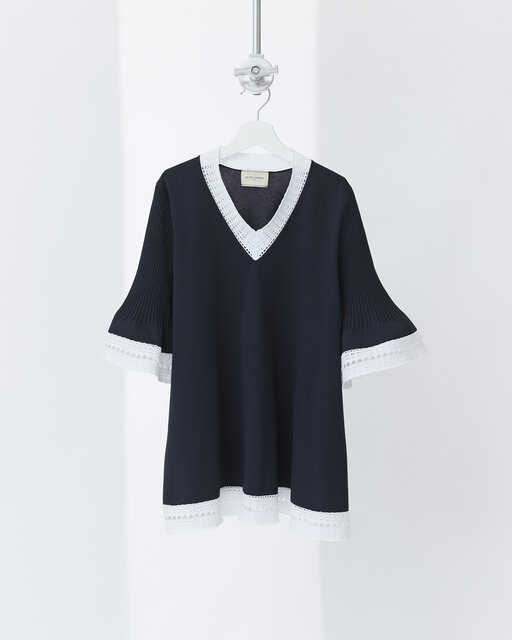 サステナブル素材を使用した「UNITED ARROWS」のニットチュニック。