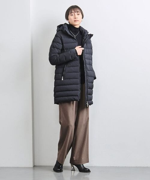 防寒性の高い服装の女性