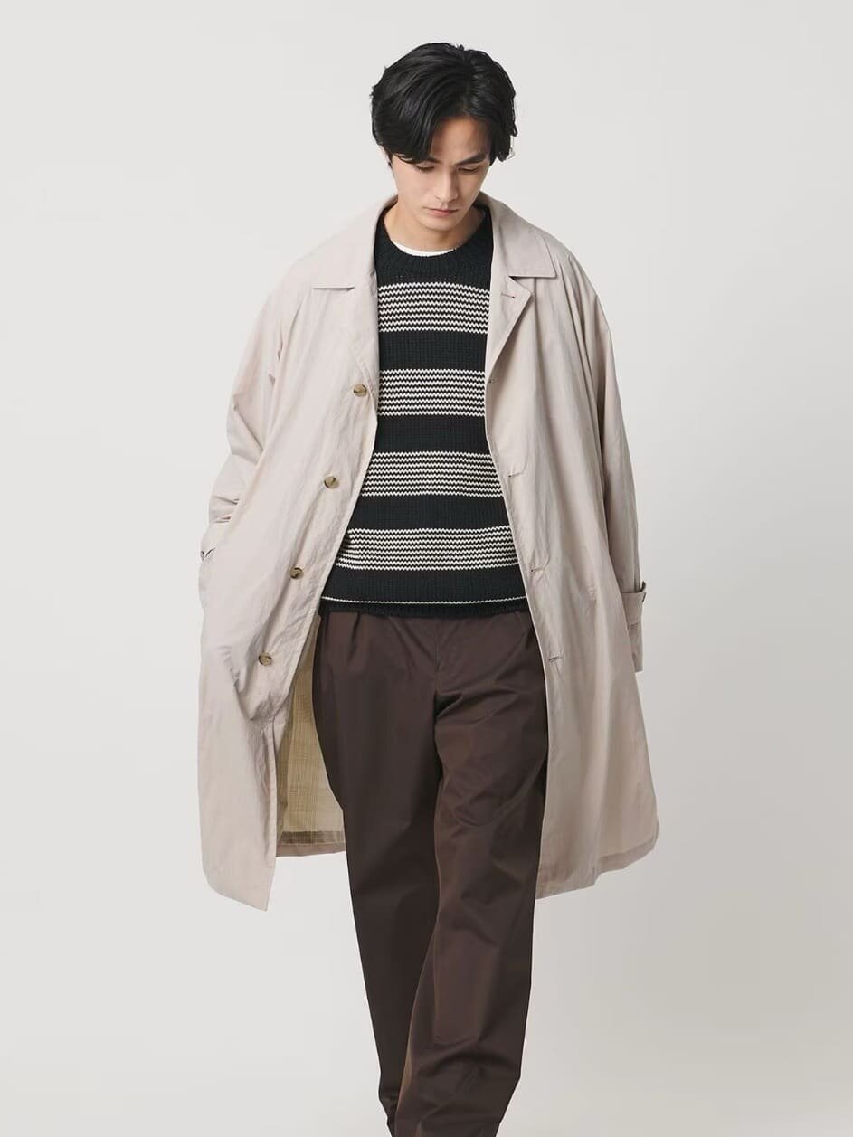 セットアップを着た男性