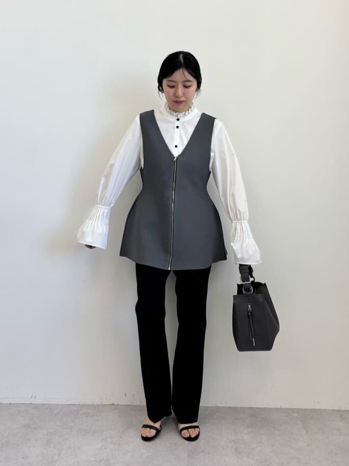 チュニックを着た女性