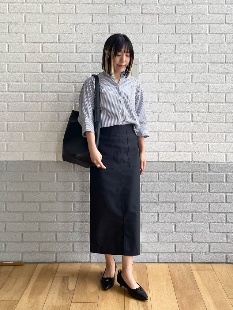 5分袖のブラウスを着た女性