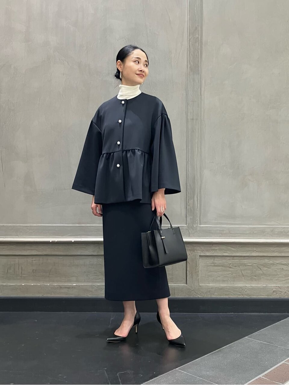 ジャケットを着た女性